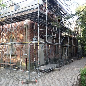 Renovation of late 19th century stable and carriage house building, now off-show animal building, 2024-05-10