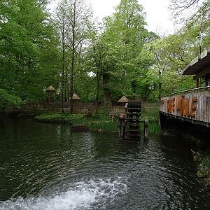Restaurant terrace with goat enclosure in the back