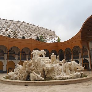 Golden Clock Square entrance area fountain with animal statues and roof construction of The Sanctuary, 2024-09-17
