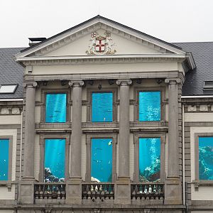 Aquarium building (1852 castle) with new ocean projection screens in windows, 2024-09-17