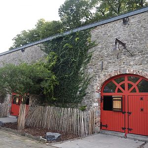 Former main gift shop building, now housing farm animal stables, 2024-09-17