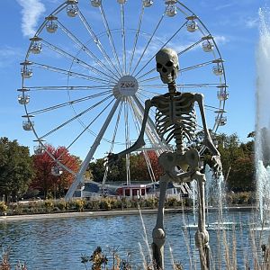 Halloween decoration w/ Ferris Wheel in the background.