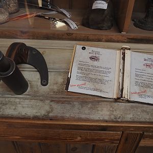 Farm area - Microscope showing slides of and signs about plague insects, 2024-06-08
