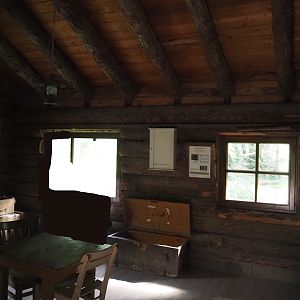 Interior of Trapper Creek Hut, themed Eurasian lynx viewing cabin, 2024-08-05