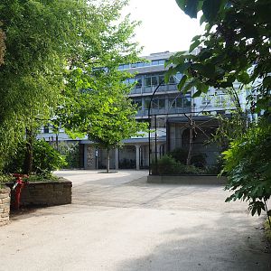 Reconstructed 1850's raptor aviaries, now used for parrots, songbirds, doves and smaller ground birds, 2023-07-22