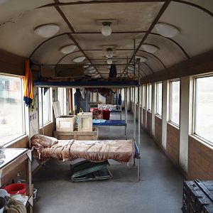 Serenga - View inside derailed train viewing area with poachers' hide-out theming, 2024-06-23