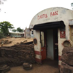 Serenga - Entrance to derailed train viewing area with poachers' hide-out theming, 2024-06-23