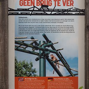 Signage about extendable monkey bridge between Javan langur exhibit and Bornean orangutan islands, 2024-08-18