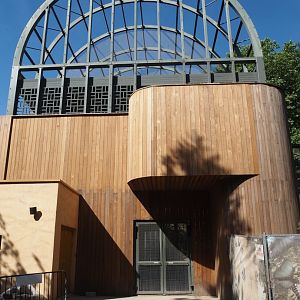 Side of the hippo house aviary with accesses to lower and upper viewing areas, 2025-05-14