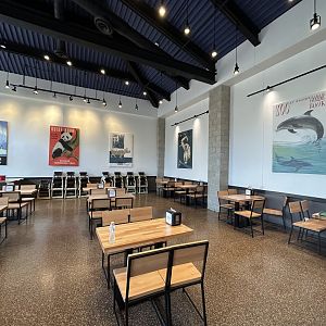 Graze Restaurant Dining Area w/ Guidebook Posters