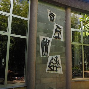 Artworks on the outside of the Riviera Hall near the Eurasian otter exhibit, 2024-06-30