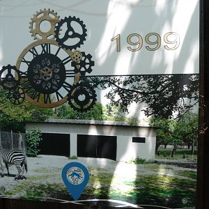 1999 picture of current snow leopard exhibit -Zoo d'Asson (2025)