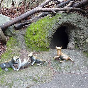 Arctic Wolf Statues + Den