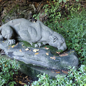 Drinking beast statue