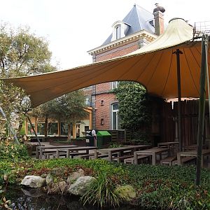 Terrace area and 1780 manor house, normally a restaurant but currently used as ticket office and gift shop building, 2024-03-04