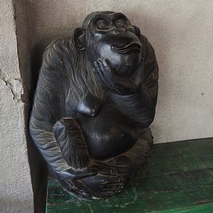Chimpanzee statue on terrace next to gift shop near entrance, 2025-04-30