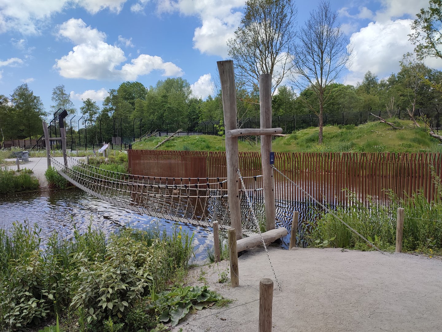 Adventure trail - suspension bridge over the water next to the tiger enclosure