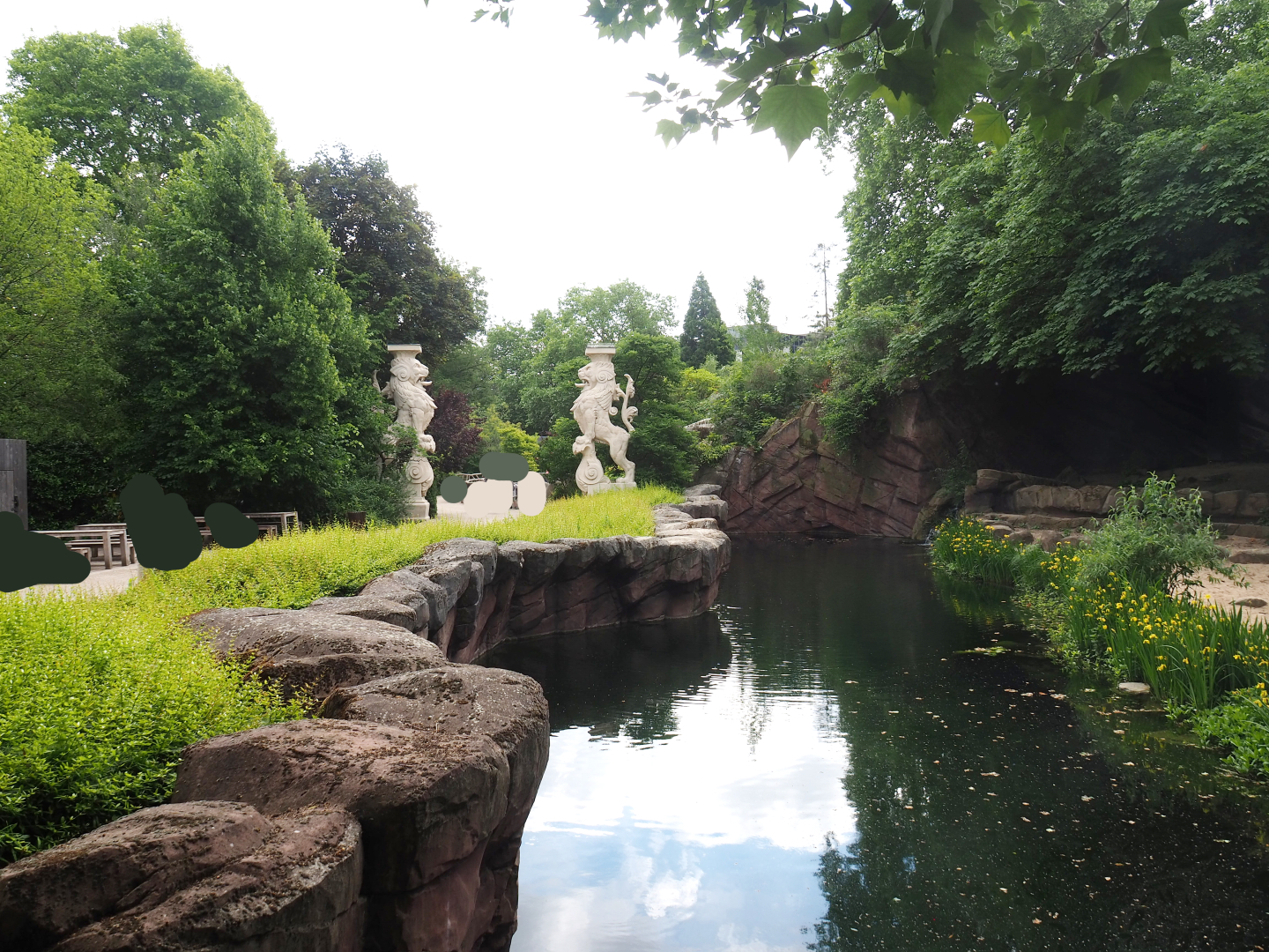 African lion exhibit moat and walkway, 2022-05-26