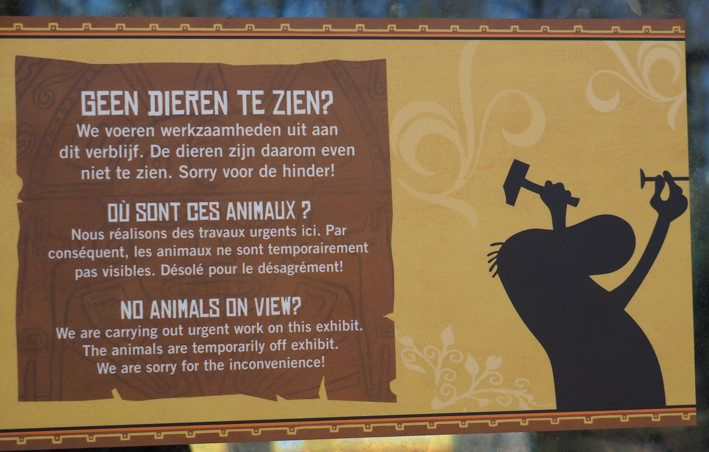 Animals off-show for construction sign on callitrichid house, 2022-03-08