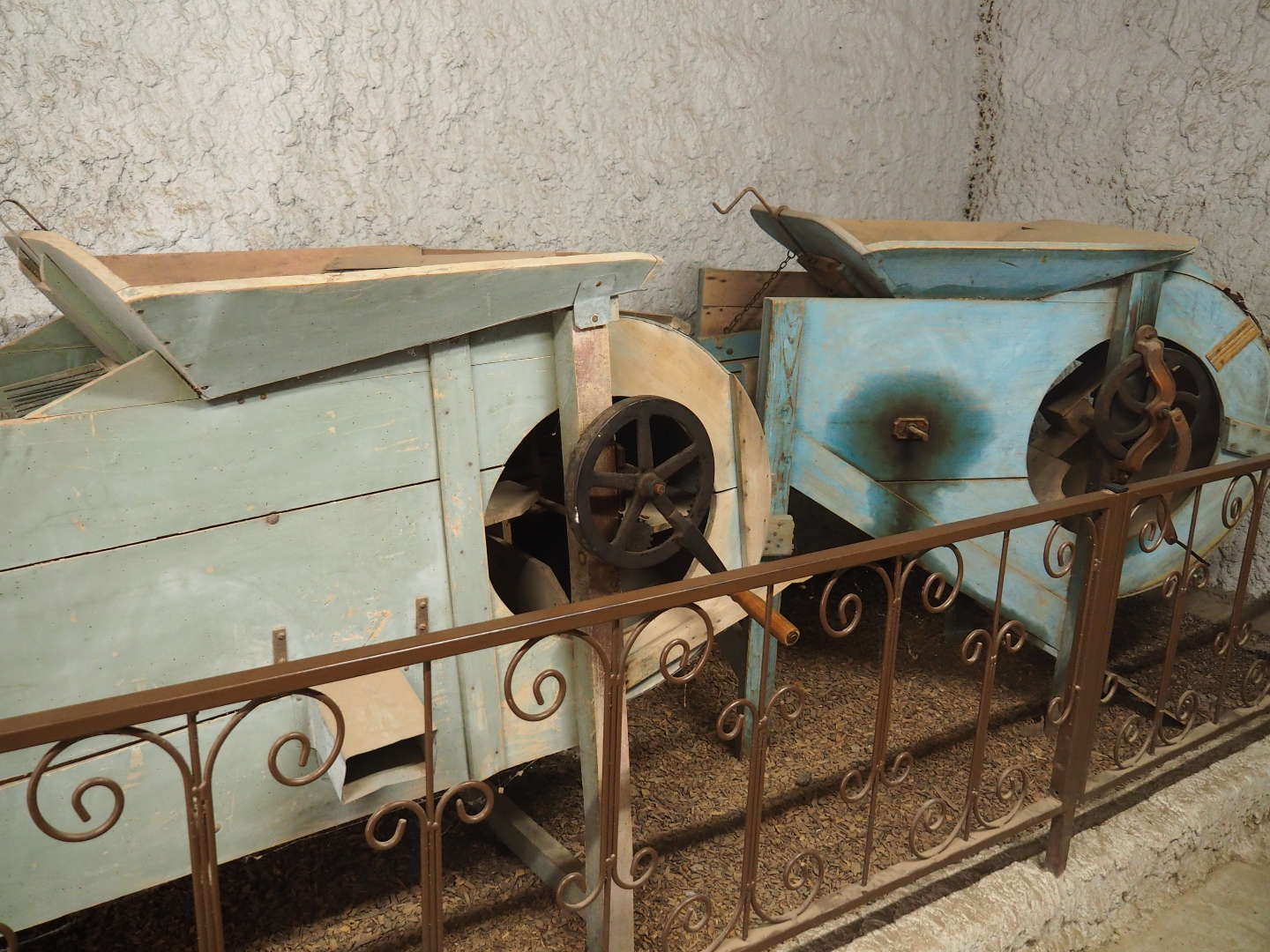Assorted objects in the entrance corridor to the tropical house - Old agricultural processing machinery, 2019-08-04