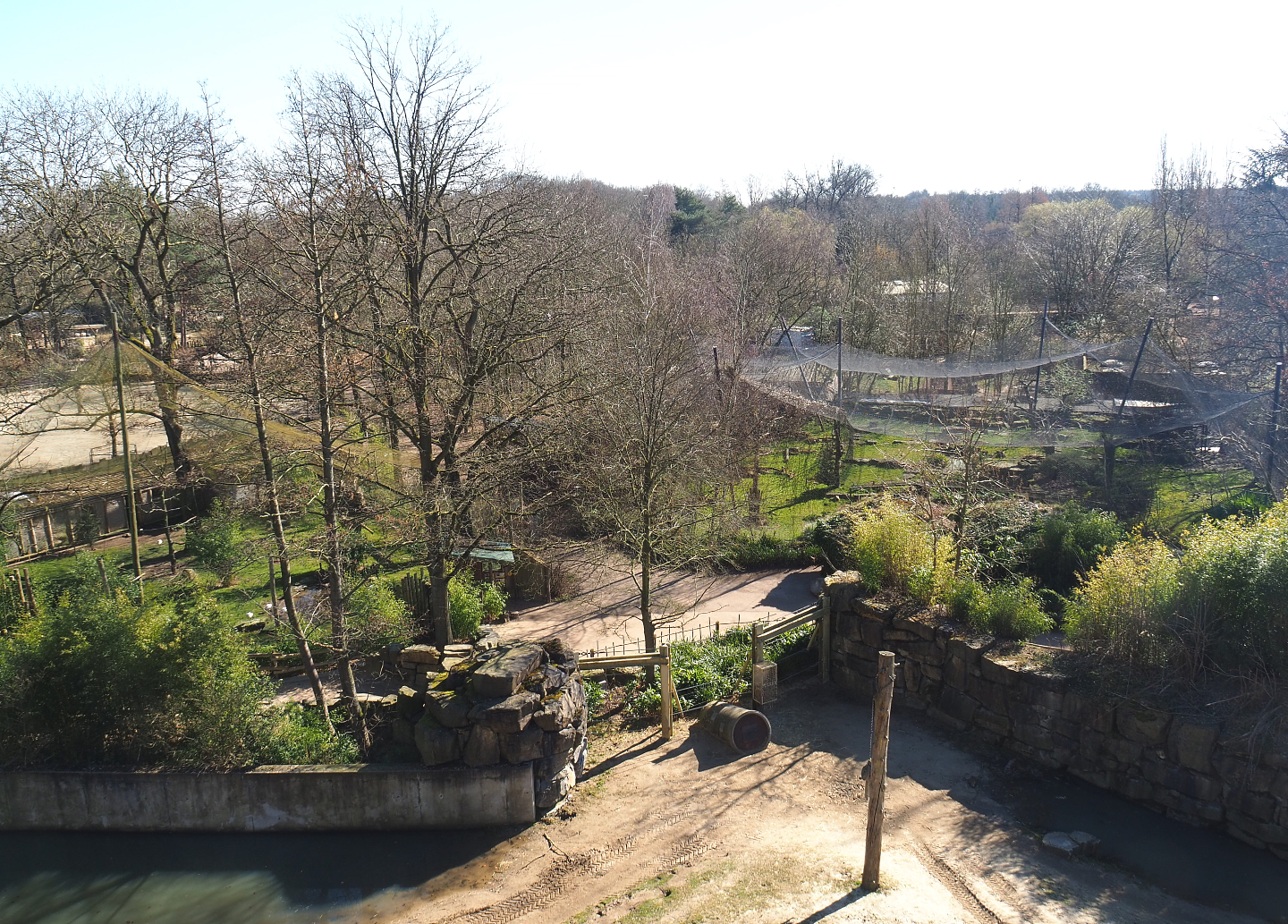 Aviary, snow leopard exhibit and Asian elephant feeding and enrichment area, seen from the tree-top walk, 2022-03-08