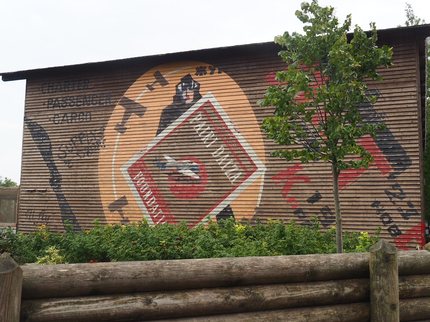 Aviation-themed barn with pelican aviary and storage and work areas for theming materials, 2023-10-13