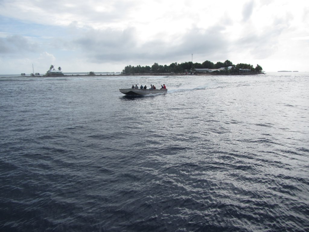 Barge on its way out to meet the boat