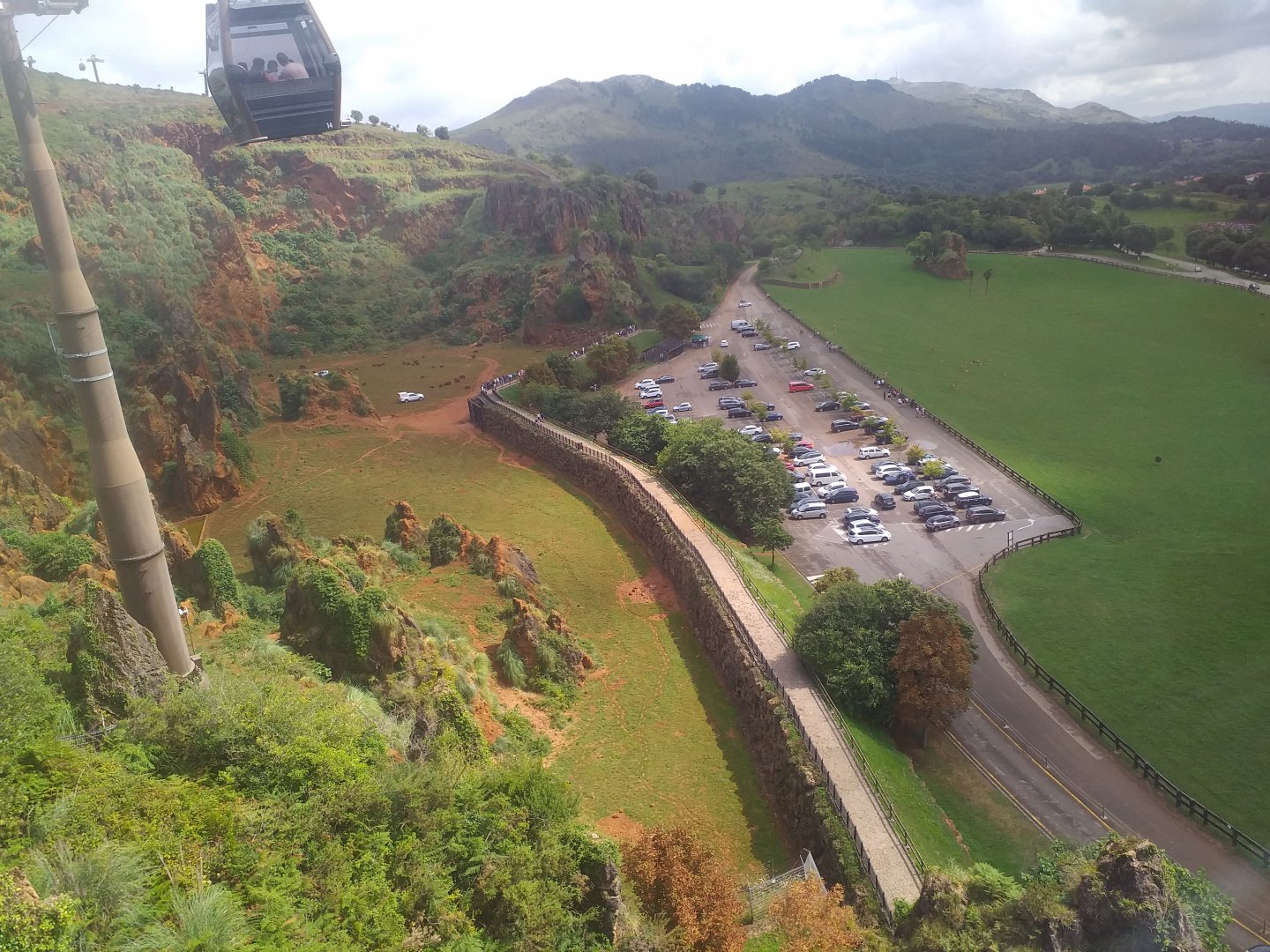 Bear-Giraffe exhibit from cable car-Cabarceno (2019)