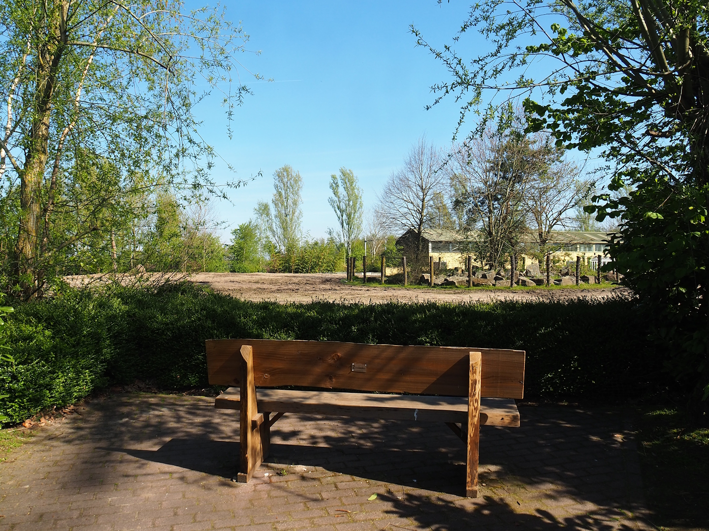 Bench with view of Asian elephant, Chital, Red deer and Crab-eating macaque exhibit, 2023-04-30