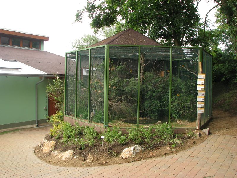 Bird aviary in front of indian rhino house