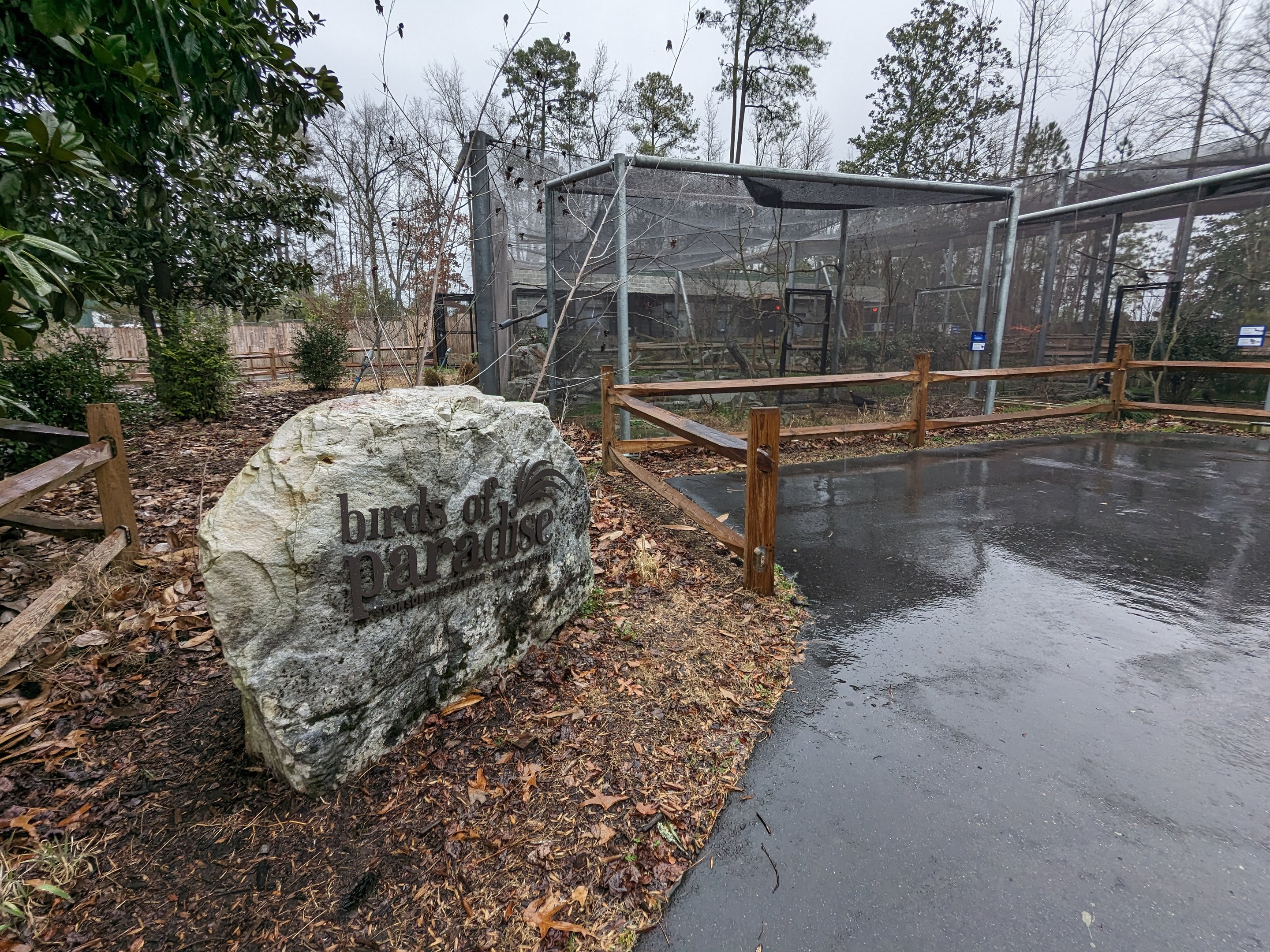 Birds of Paradise aviary with sign