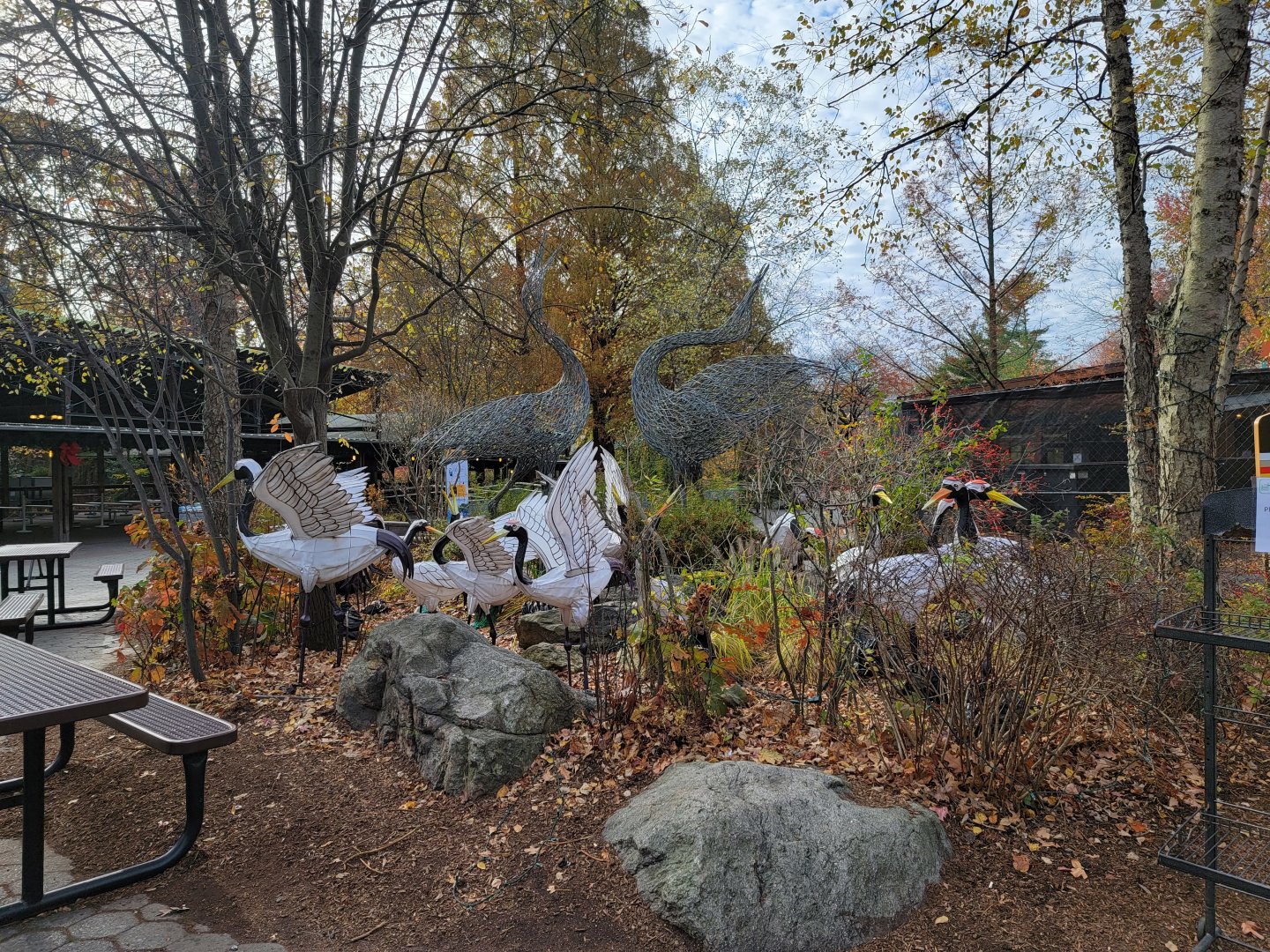 Bronx - Dancing Crane Cafe statues and holiday lights