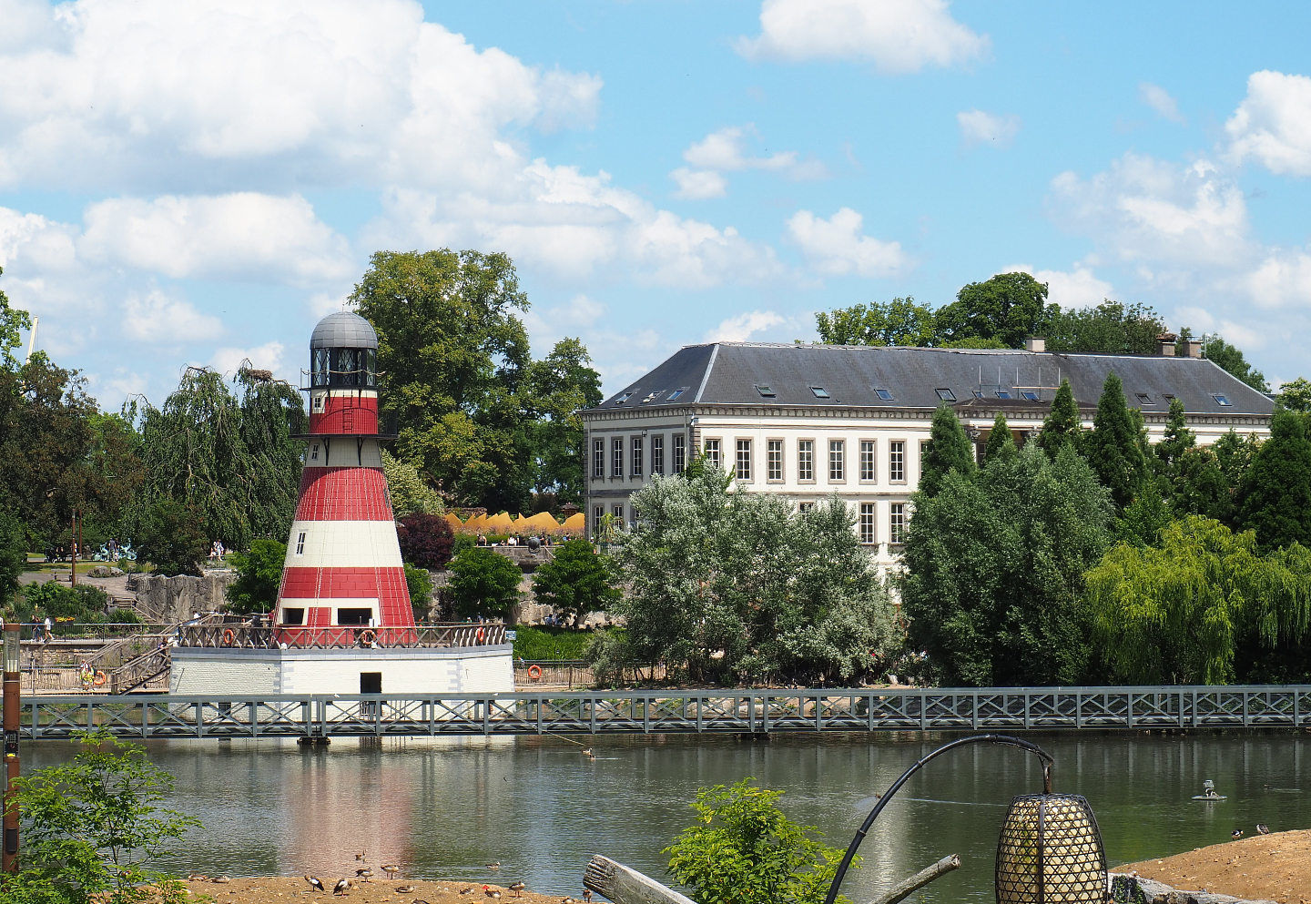 Cambron-by-the-Sea Lighthouse and Backside of Nautilus aquarium building, seen from The Kingdom of Ganesha, 2022-06-28