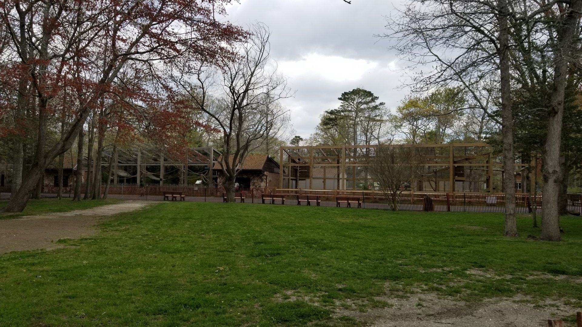 Cape May - Emperor tamarin, crested caracara exhibits from savanna entrance
