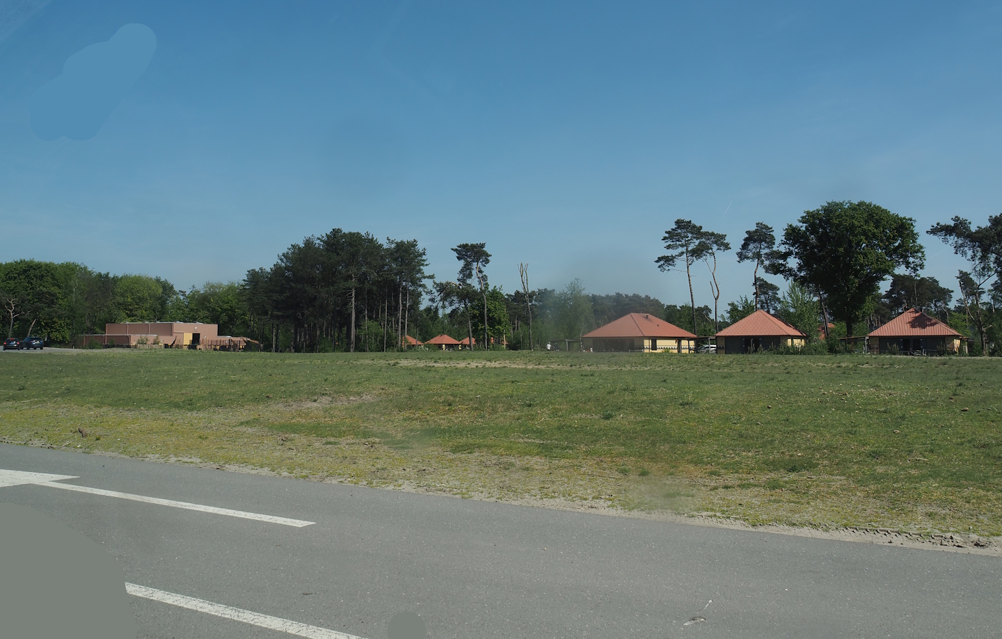Car safari - Giraffe plains, with Safari resort bungalows in the background, 2025-04-30