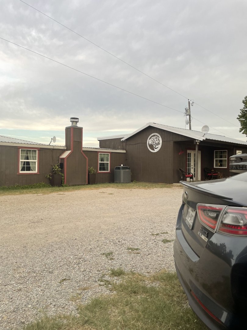 CARE Giftshop and Main House Exterior