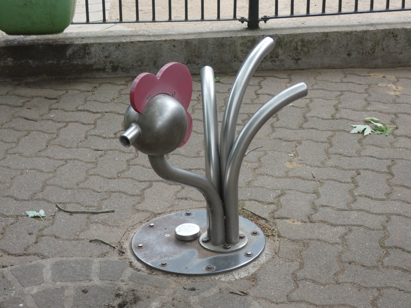 Chicken tap by sand pit