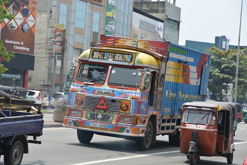 Colourful vehicles + tuk tuk