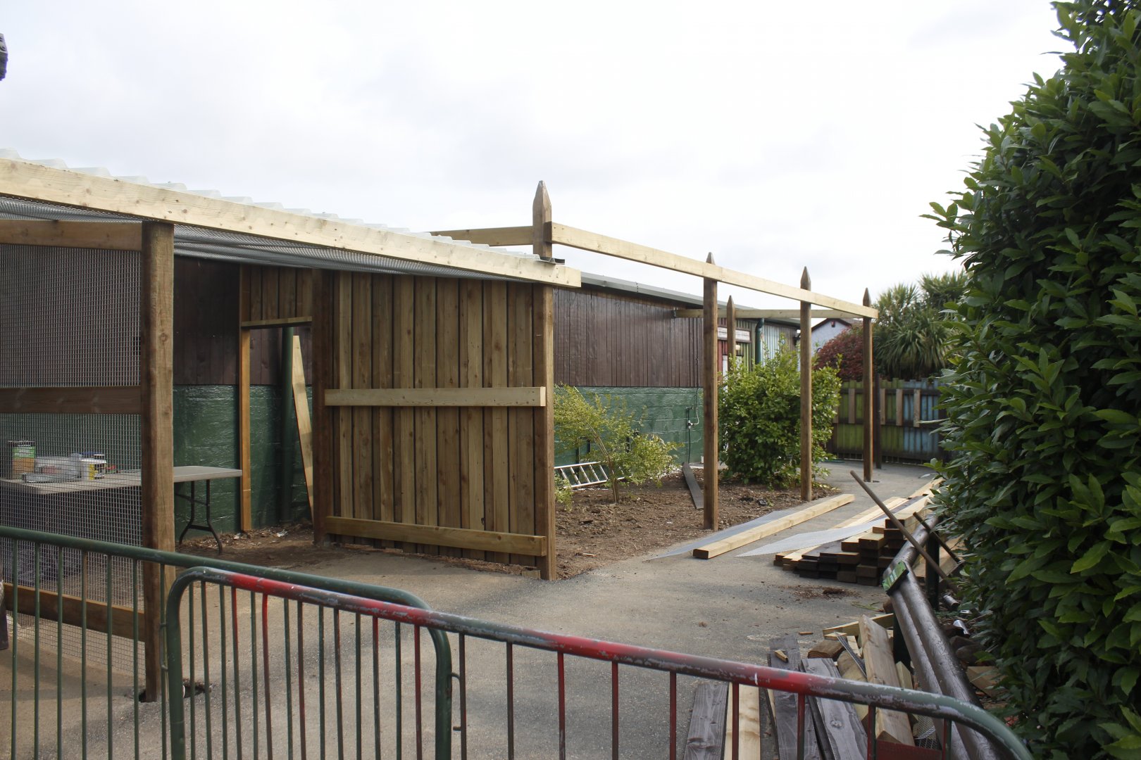 Construction on new enclosure on the site of former small bird aviary out side tropical trails