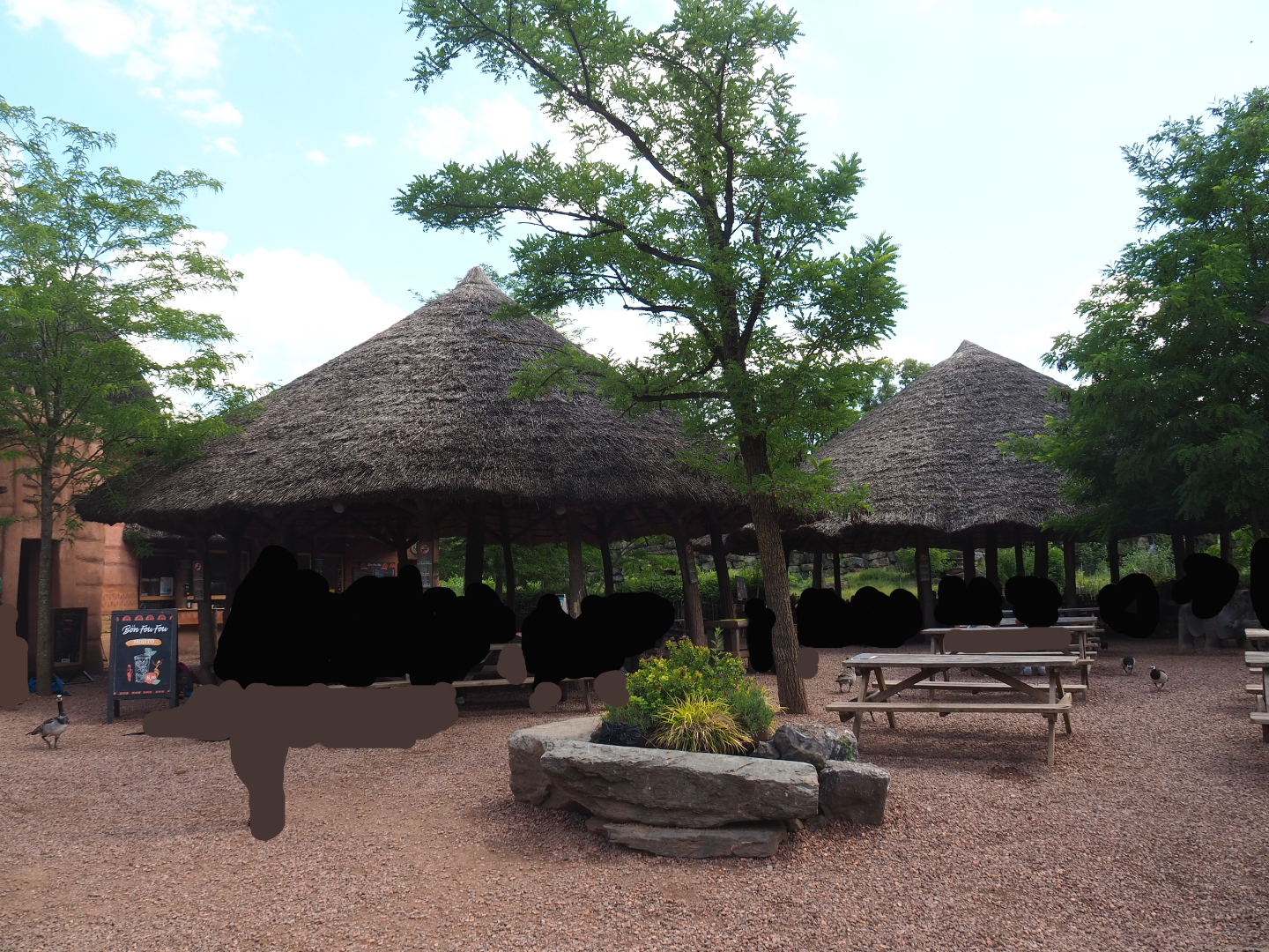 Covered eating areas in Tamberma African village, 2022-06-28