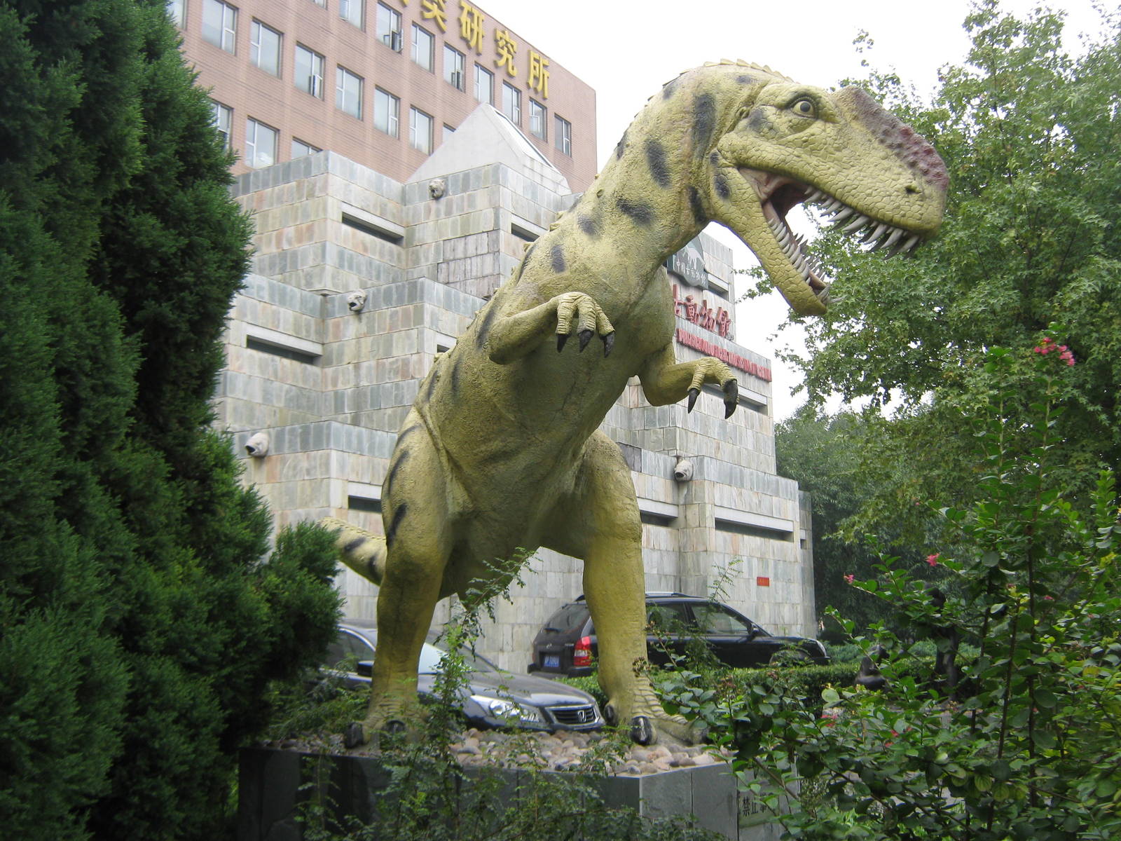 dinosaur model outside the museum