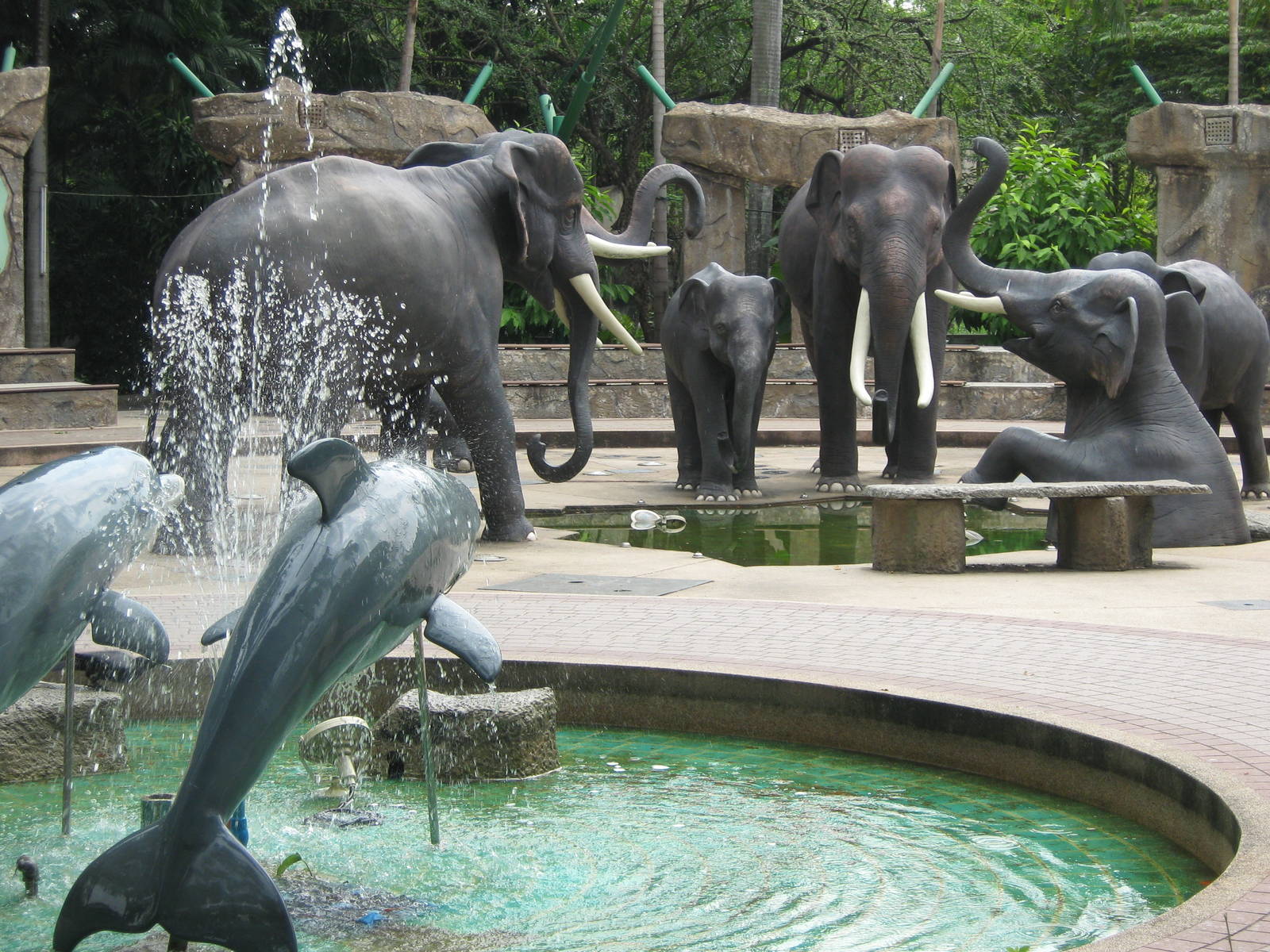 dolphin and elephant statues