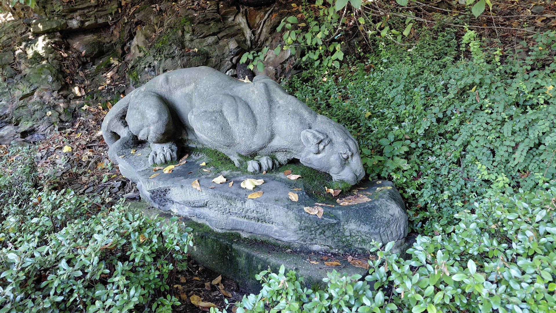 Drinking beast statue