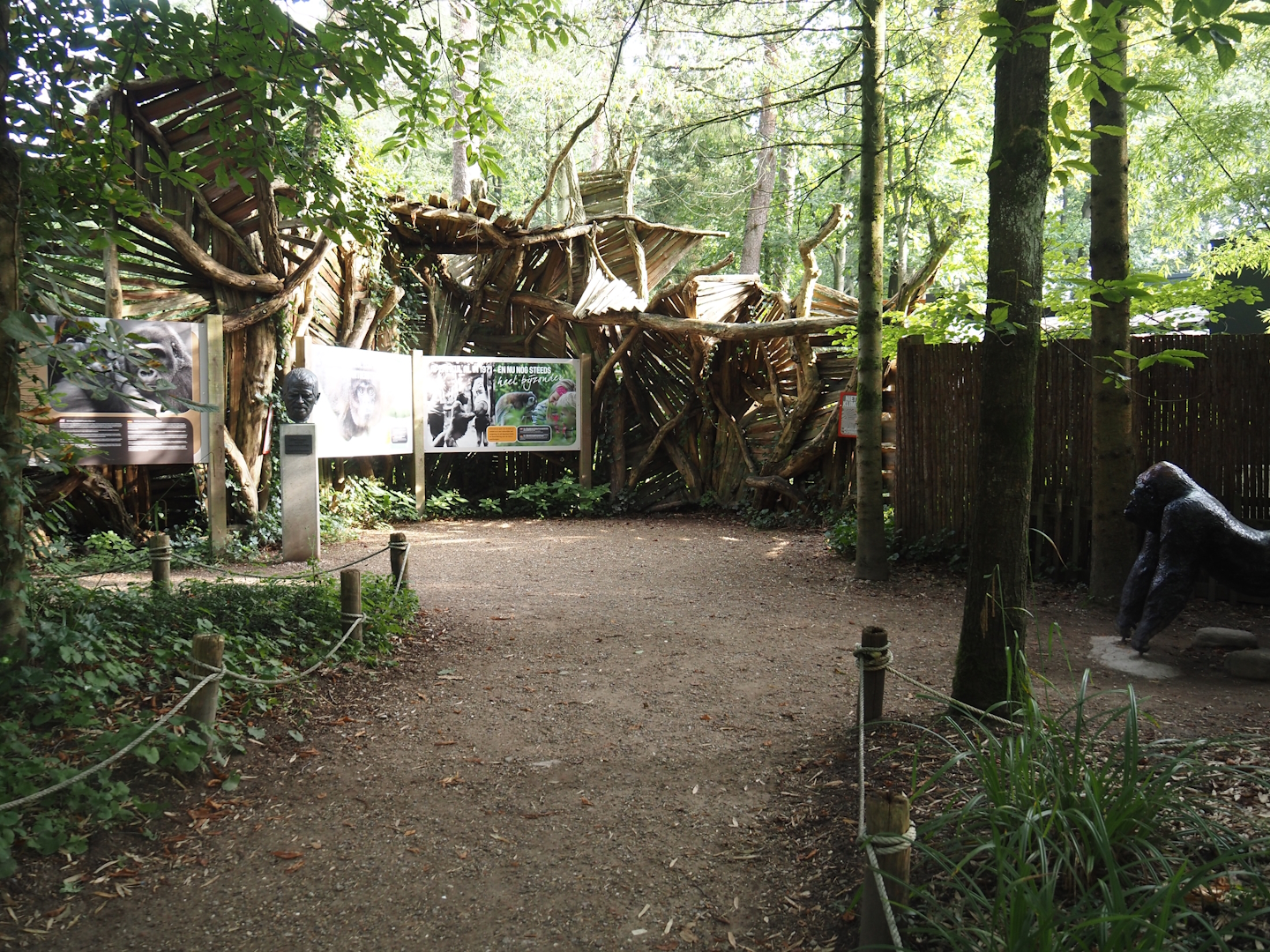Education corner with bust sculpture of and signage about Apenheul's founder Wim Mager (1940-2008), 2024-08-18