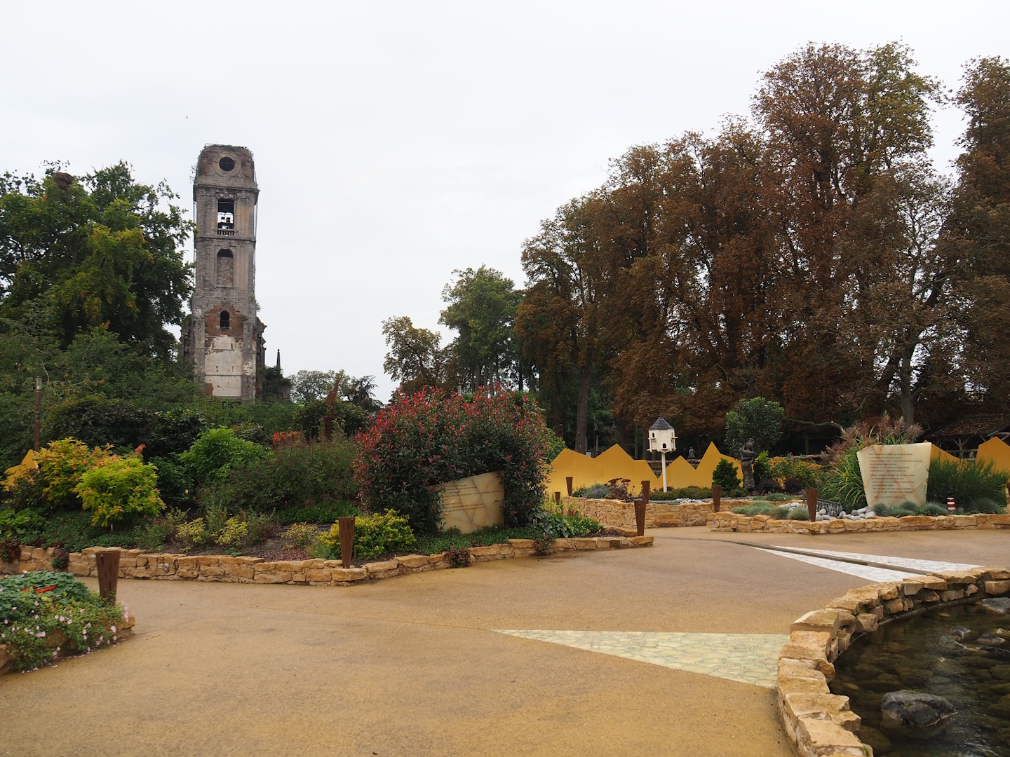 Egg of the World entrance area and old abbey tower, 2023-10-13