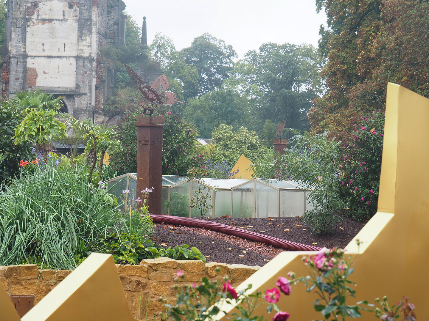"Egg of the World" future entrance area - Road sign for and small representation of future world "The Sanctuary", 2022-09-14