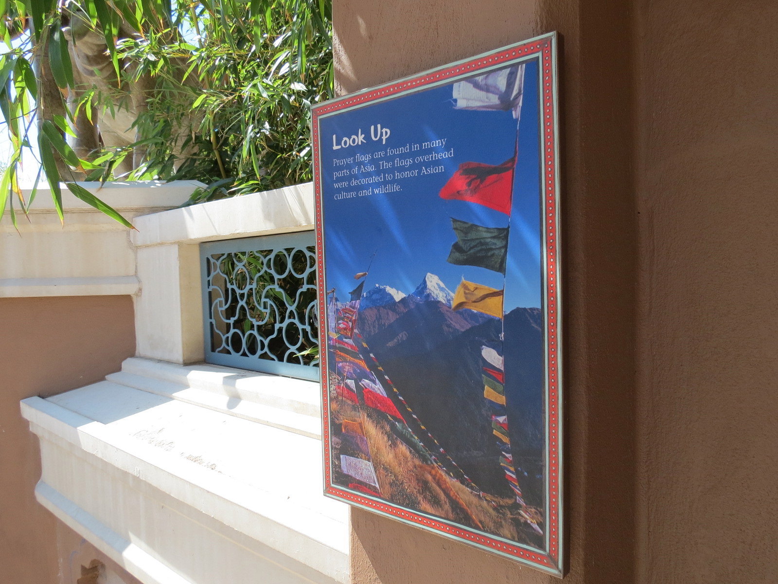 Elephant Passage - Elephant House Exterior - Prayer Flags Sign