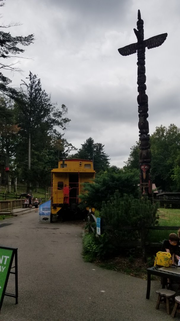 Elmwood Park - Totem and train car with bison info