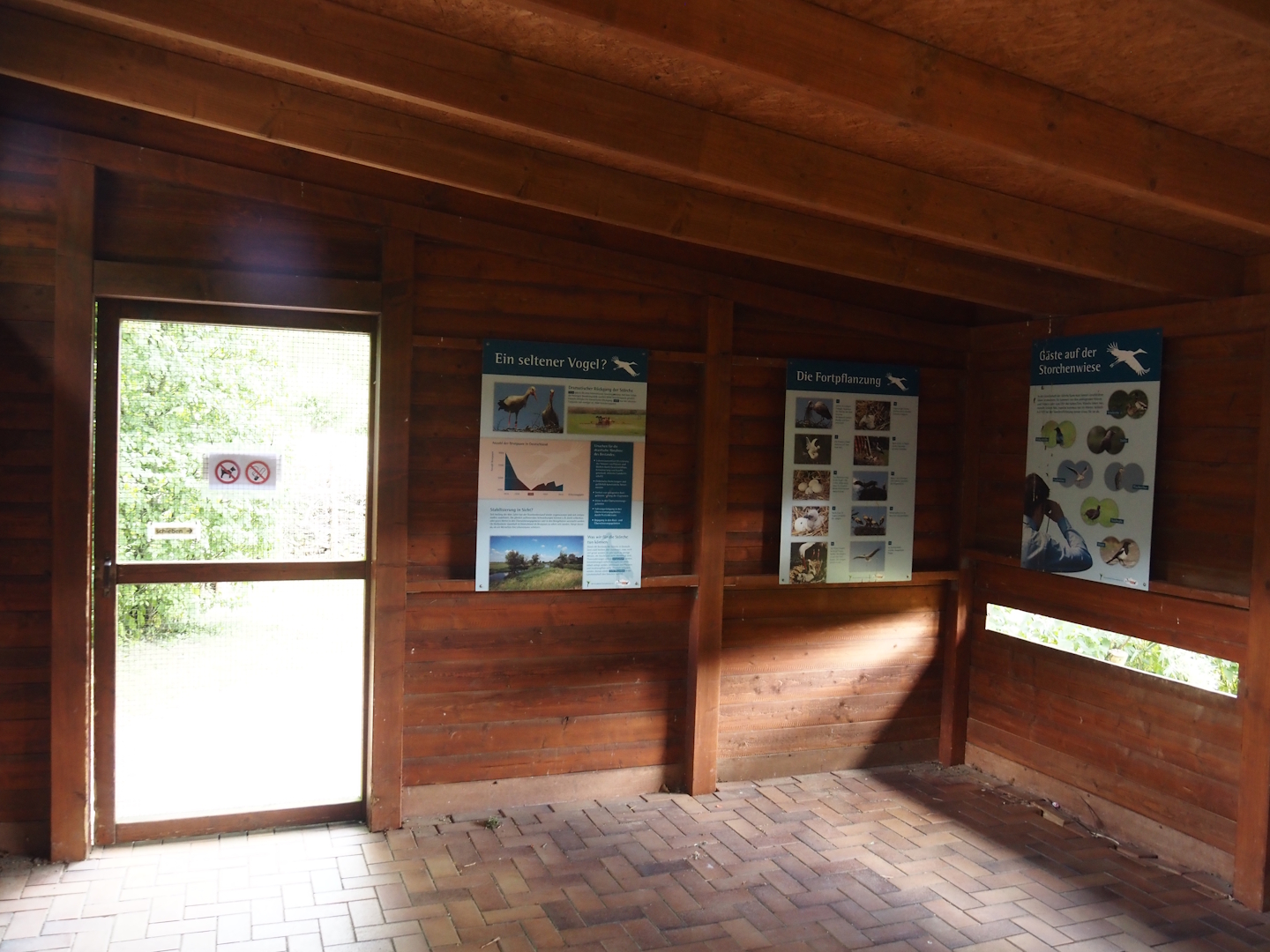 Entrance hide for the European white stork reserve - Educational signage and viewing slot, 2025-05-22