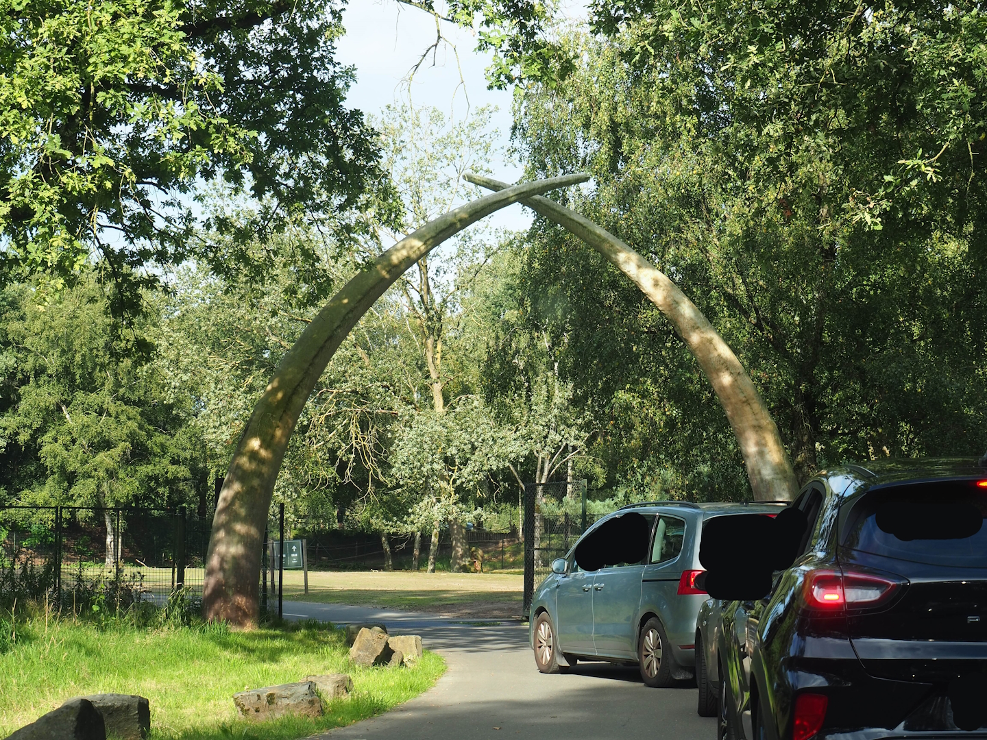 Entrance of multi-hectare savanna drive-through with giant tusks, 2023-08-15